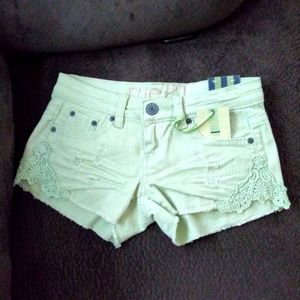 Rue21 juniors distressed light green denim shorts, size 0